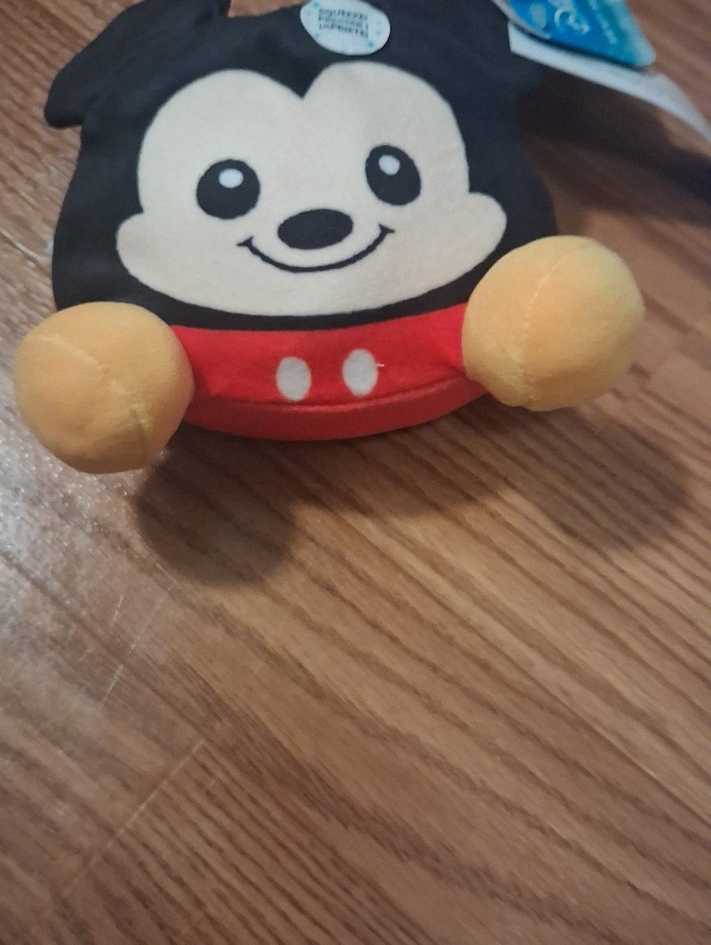 Plush Black and Red Character Soft Toy with Yellow Accents